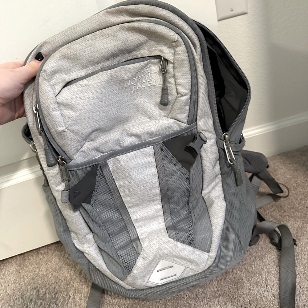 Gray and white Northface Backpack